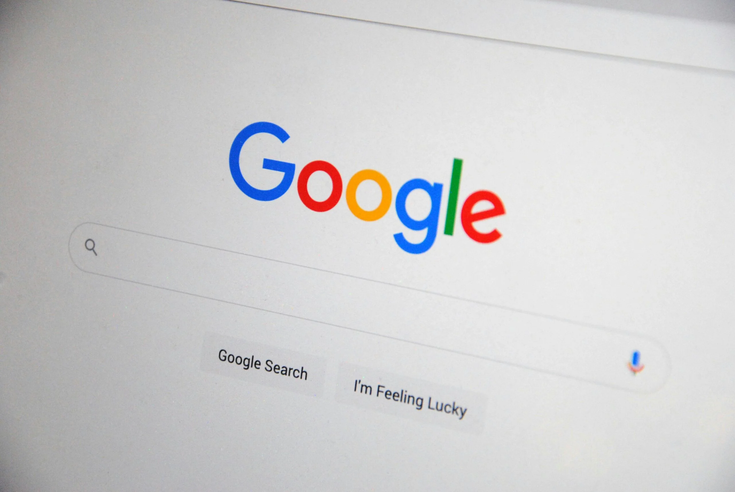 Google search homepage with logo, search bar, and options for Google Search and I’m Feeling Lucky